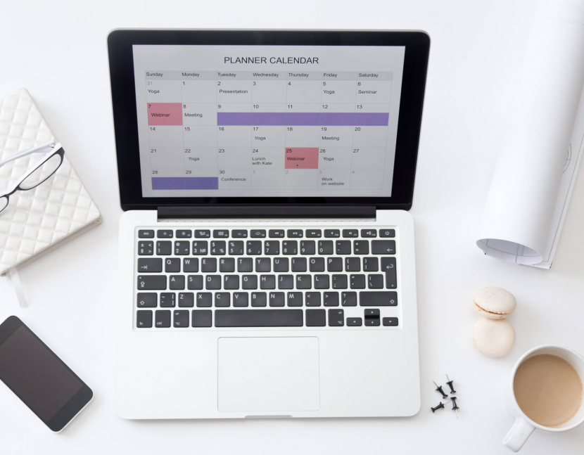 high-angle-view-image-of-desk-planner-calendar-on-laptop (1)